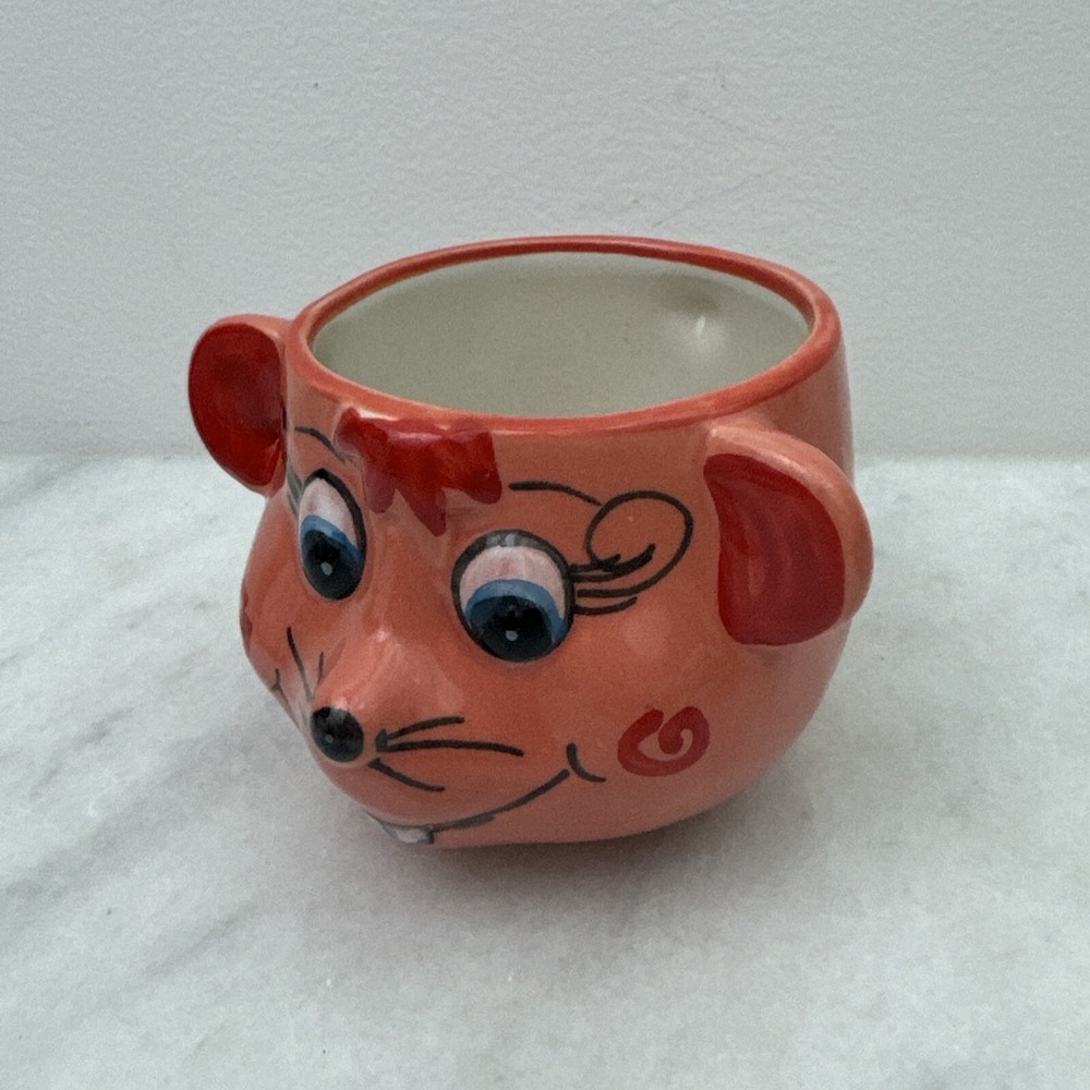 Germany pink mouse head mug hand